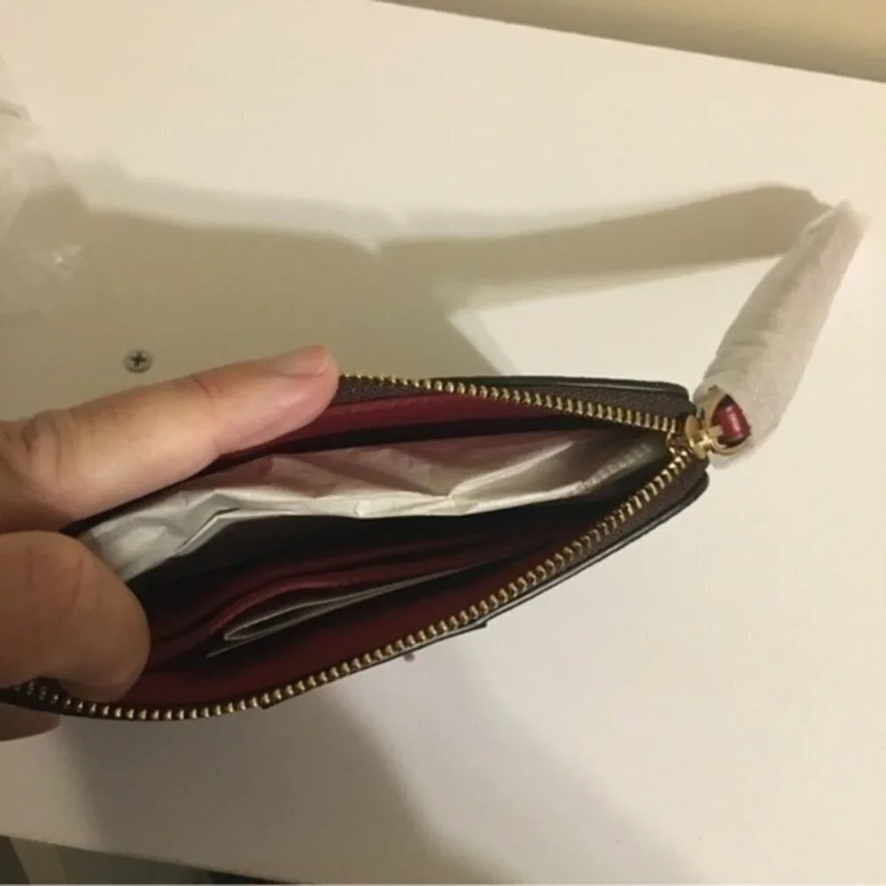 Coach signature coated canvas wristlet